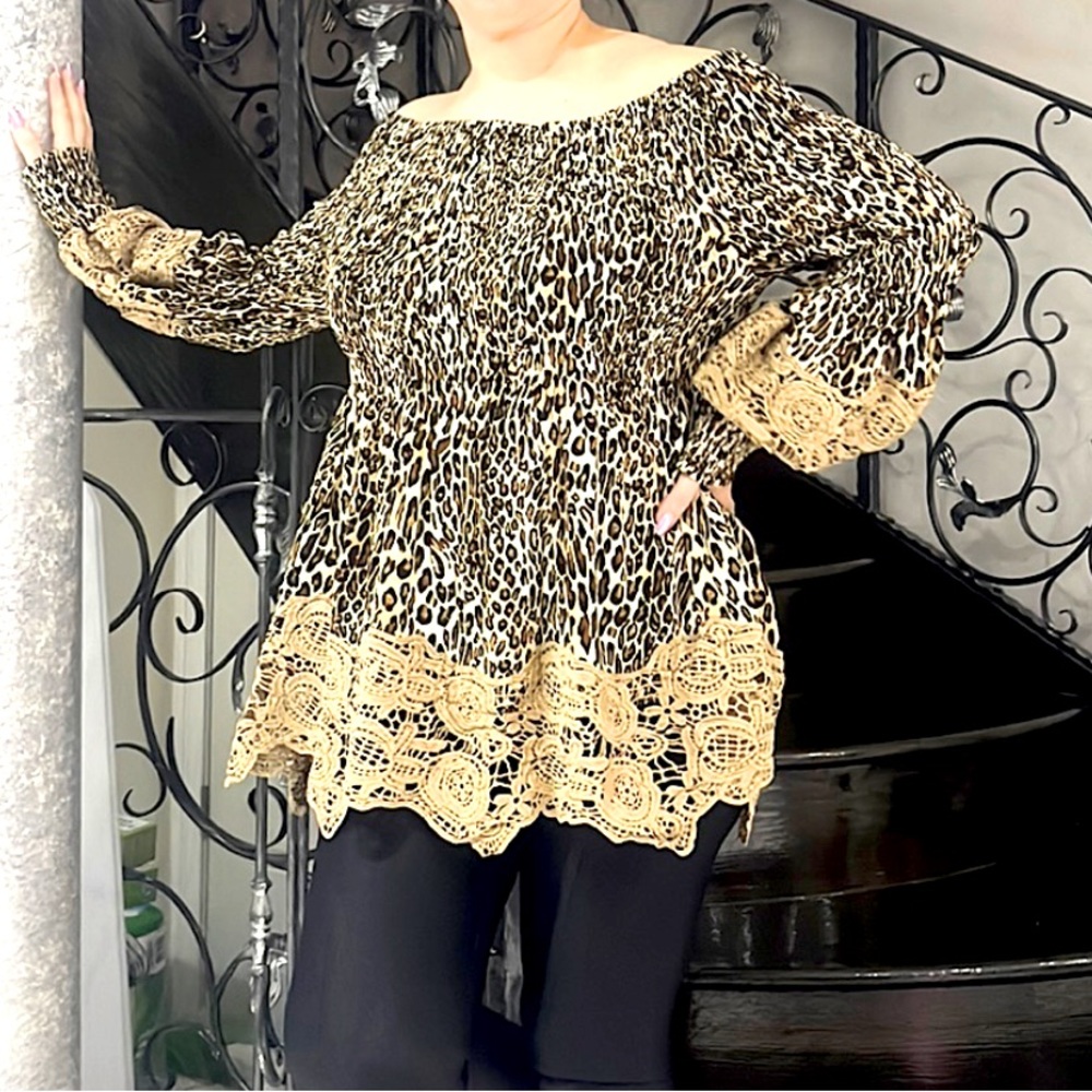 Off shoulder long sleeve blouse with lace detailing.NWT